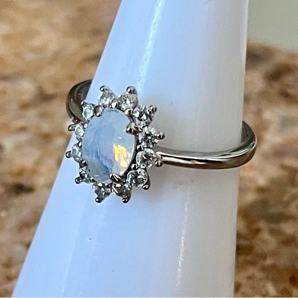 Fragrant Jewels Opalescent White Moonstone Halo Ring in Silver